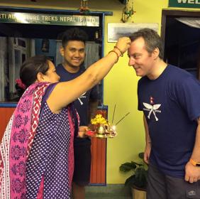 Ashik’s mother applying tikka and wishing me a safe journey home